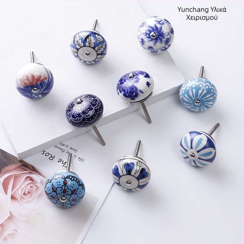 Yunchang στρογγυλή κεραμική λαβή για ντουλάπες και συρτάρια — μοντέρνος μινιμαλιστικός στυλ, ελαφρύς πολυτελής χαρακτήρας; υλικό κεραμικό; επίστρωση ηλεκτροπλατίωσης; μάρκα Yunchang Hardware.