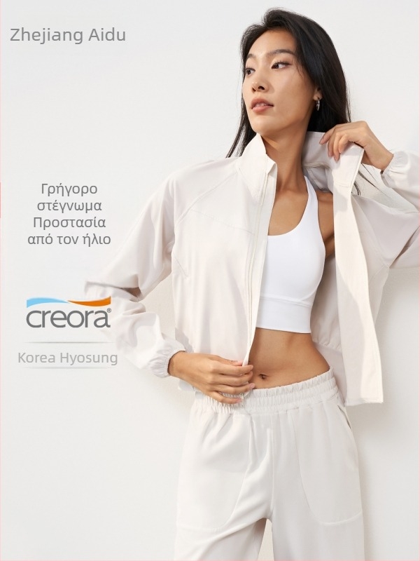 Γυναικείο μπουφάν γιόγκα με προστασία από τον ήλιο, υφαντό ύφασμα, 91% πολυεστέρας και 9% ελαστάν; μακριά μανίκια, φαρδιά γραμμή, σταθερό standing collar με μπροστινό φερμουάρ, μήκος μέχρι τους γοφούς.