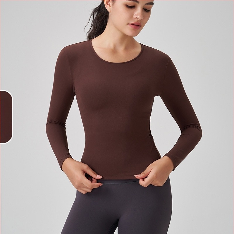 Γυναικειό μακρύρραυχο αθλητικό τοπ με στρογγυλό λαιμό – στενή γραμμή, διαπνέουσα νάιλον-σπάντεξ 91%/9%, μήκος στους γοφούς, για τρέξιμο, γυμναστική και γιόγκα