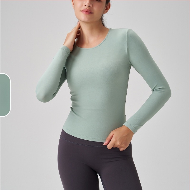 Γυναικειό μακρύρραυχο αθλητικό τοπ με στρογγυλό λαιμό – στενή γραμμή, διαπνέουσα νάιλον-σπάντεξ 91%/9%, μήκος στους γοφούς, για τρέξιμο, γυμναστική και γιόγκα