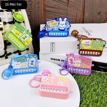 Μίνι πιάνο σε αλυσίδα κλειδιών με φως — εκπαιδευτικό φορητό μουσικό παιχνίδι από πλαστικό