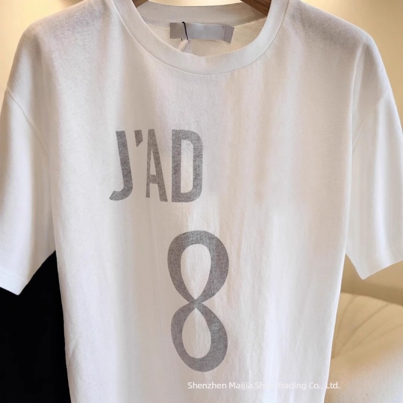 Γυναικείο βαμβακερό T-shirt με εκτύπωση γραμμάτων, κοντά μανίκια, στρογγυλός λαιμός, χαλαρή γραμμή, καθημερινό στυλ — Καλοκαίρι 2025