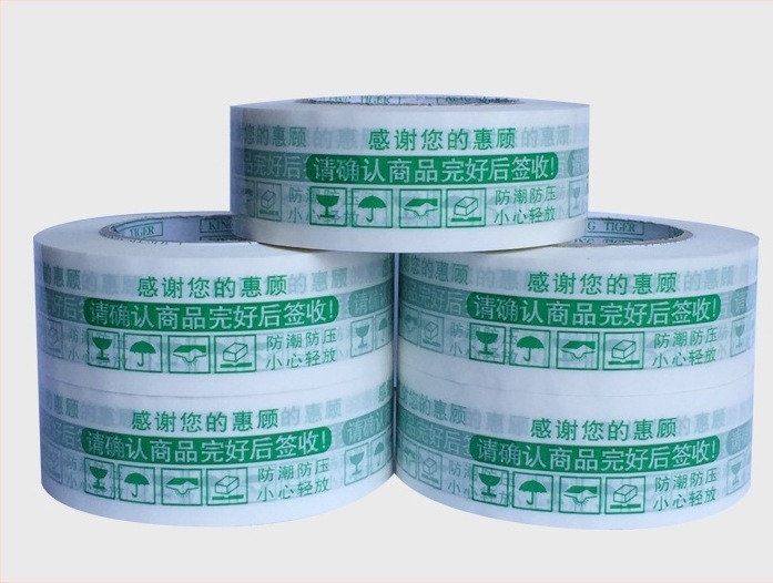 Ταινία συσκευασίας με προειδοποιητικό λογότυπο; φιλμ πάχος 28 μm; κόλλα PSA; κοπή με μαχαίρι; κατάλληλη για σφράγιση και συσκευασία.