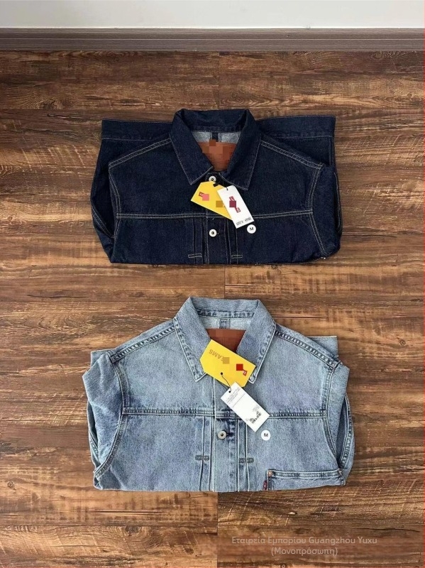 Πλυμένο τζιν μπουφάν με γιακά λάπελ, μονόμπορτο, κανονικό μήκος, πολλαπλά τσεπάκια