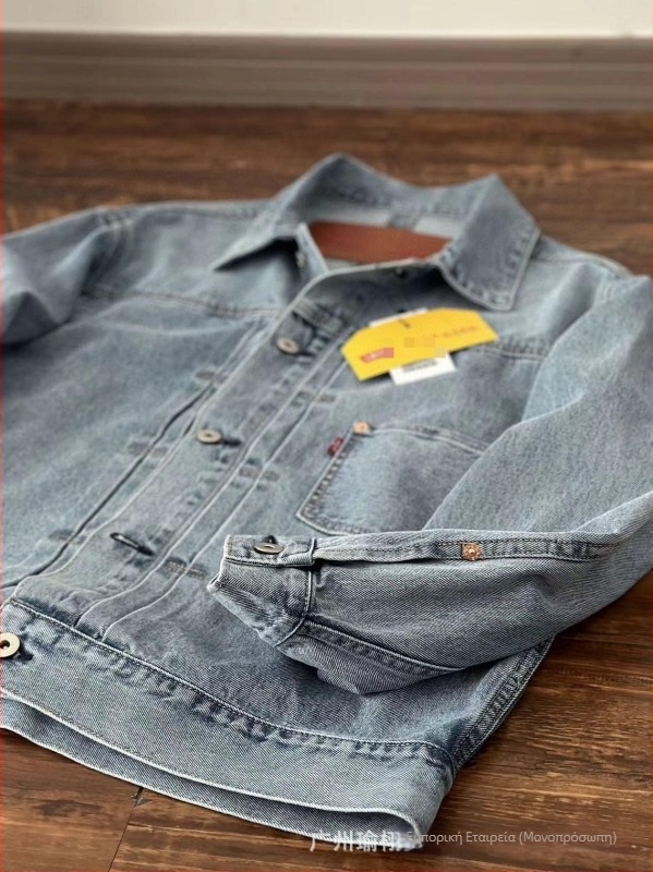 Πλυμένο τζιν μπουφάν με γιακά λάπελ, μονόμπορτο, κανονικό μήκος, πολλαπλά τσεπάκια