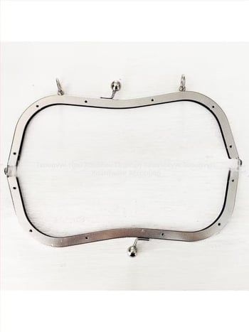 Αξεσουάρ για τσάντες με σκελετό με οπή βιδωτής, 27 κοιλότητες στη μέση και embossed κυκλική κεφαλή bead, σχέδιο bucket-ear. Υλικό: σίδηρος. Κωδικός προϊόντος: 000306. Haowen luggage accessories factory. Φθινοπωρο 2024. Αξεσουάρ για τσάντες.