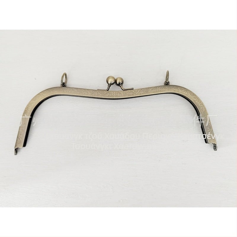 Αξεσουάρ για τσάντες με σκελετό με οπή βιδωτής, 27 κοιλότητες στη μέση και embossed κυκλική κεφαλή bead, σχέδιο bucket-ear. Υλικό: σίδηρος. Κωδικός προϊόντος: 000306. Haowen luggage accessories factory. Φθινοπωρο 2024. Αξεσουάρ για τσάντες.