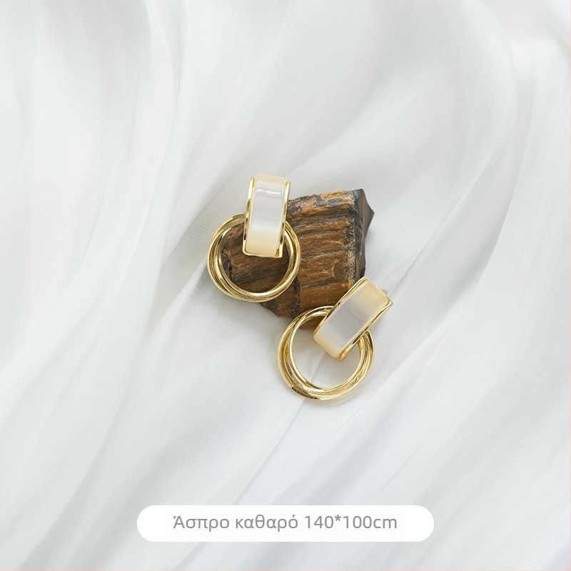 Φόντο από πλισέ ύφασμα με μικροπερλέν φινίρισμα για φωτογράφιση μανικιούρ, κοσμημάτων και καλλυντικών