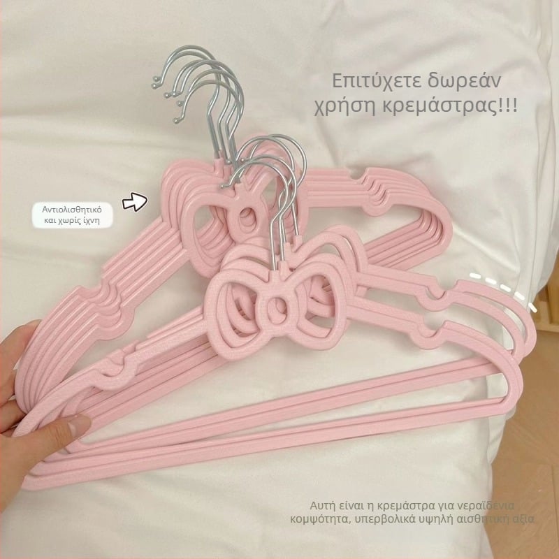 Ροζ πλαστική κρεμάστρα ρούχων με μοτίβο καρδιάς και φιόγκο, αντιολισθητική, μήκος 40 cm