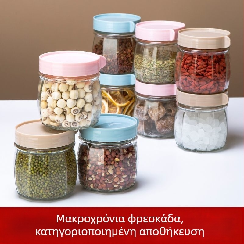 Γυάλινα αεροστεγή βάζα για αποθήκευση τροφίμων: καρύδια, κρυσταλλική ζάχαρη και καρυκεύματα πιπεριού