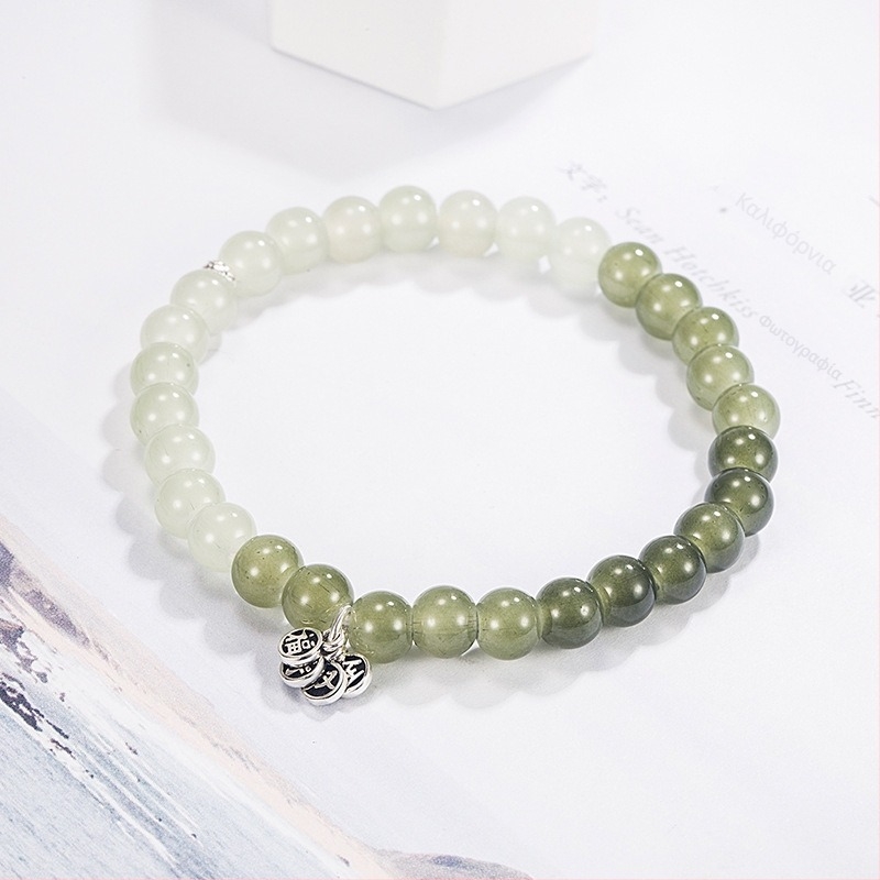 Διαβαθμισμένο βραχιόλι από Hetian jade σε πράσινο-λευκό, γυναικείος ρετρό σχεδιασμός, Φθινοπωρινός-Χειμερινός 2022.