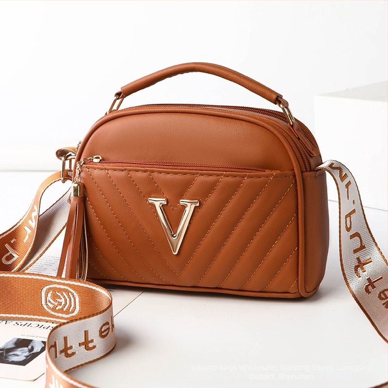 Γυναικεία crossbody τσάντα με ανάγλυφο σχέδιο, κομψή και ευέλικτη