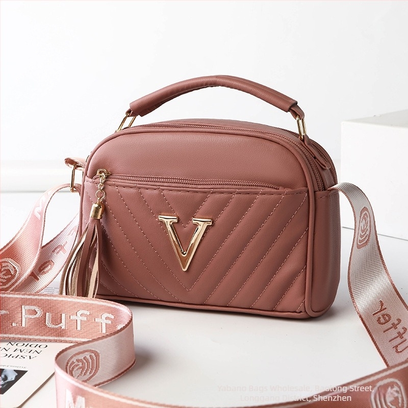 Γυναικεία crossbody τσάντα με ανάγλυφο σχέδιο, κομψή και ευέλικτη