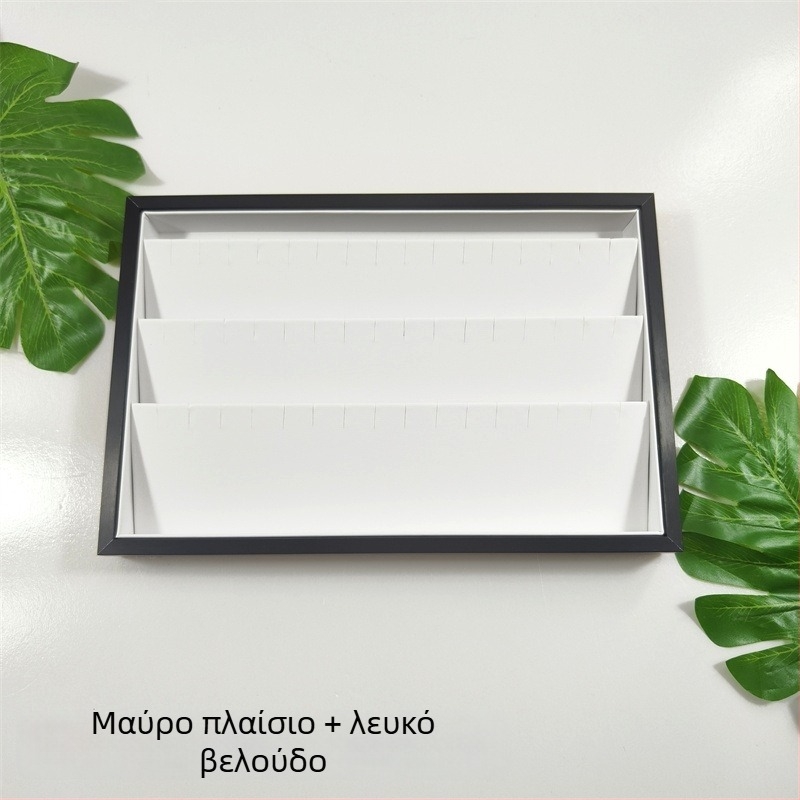 Πλαίσιο από χρυσό μέταλλο για προβολή κοσμημάτων: σκουλαρίκια και κολιέ