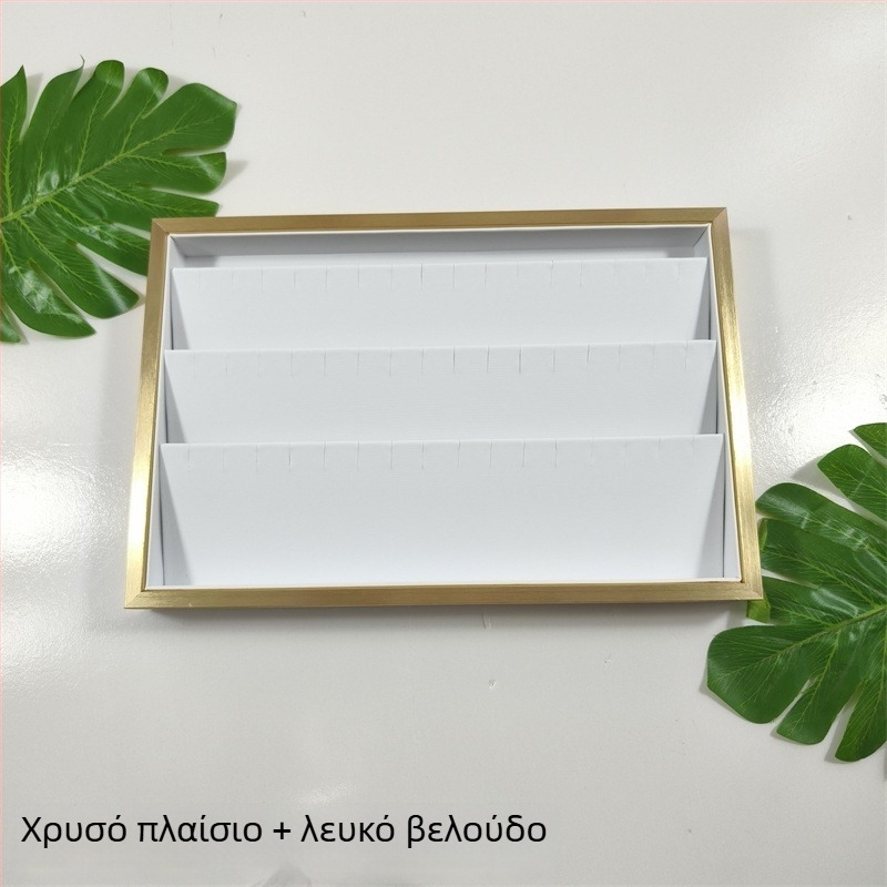 Πλαίσιο από χρυσό μέταλλο για προβολή κοσμημάτων: σκουλαρίκια και κολιέ