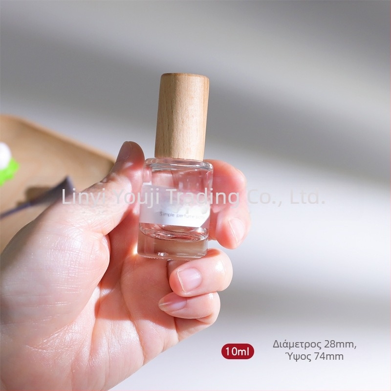 Γυάλινο μπουκαλάκι αρώματος 10 ml με ξύλινο καπάκι, λογότυπο μεταξοτυπίας, ψεκασμός λεπτής ομίχλης