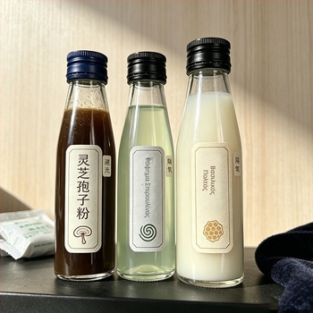 100 ml διαφανές γυάλινο μπουκάλι για στοματικά υγρά συμπληρώματα υγείας με κλειδωτικό καπάκι