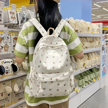 Djevojački školski ruksak s cvjetnim uzorkom, najlon (nylon; kapacitet 20–35 L; pretinac za 12-inčni prijenosnik; naramenice s zračnim jastukom; cvjetni uzorak)