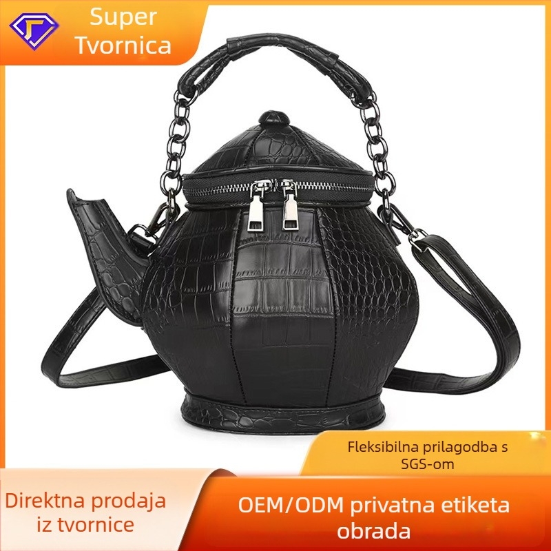 Torba u obliku čajnika, bucket bag stil, PU materijal, zatvaranje na zip, unutarnji džepovi za telefon i karticu, jedna naramenica