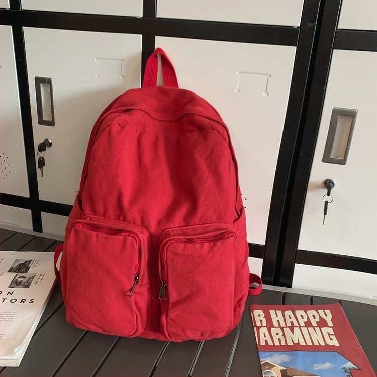 Kanvas ruksak u gradskoj jednostavnosti, s zip zatvaračem, pretincem za prijenosno računalo i unutarnjim slojem