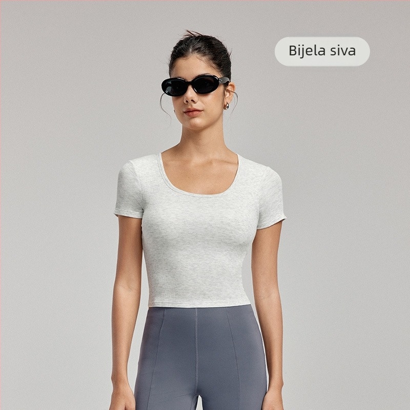 Ženski joga top s ugrađenim jastučićima za grudi - prozračna mješavina viskoze i elastana, slim-fit, dužina do struka, kratki rukavi, za jogu i fitness