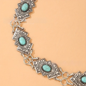 Metalni kaiš za struk s retro stilom, s ukrašenim elementima i zatvaranjem tipa lobster, proljeće 2023