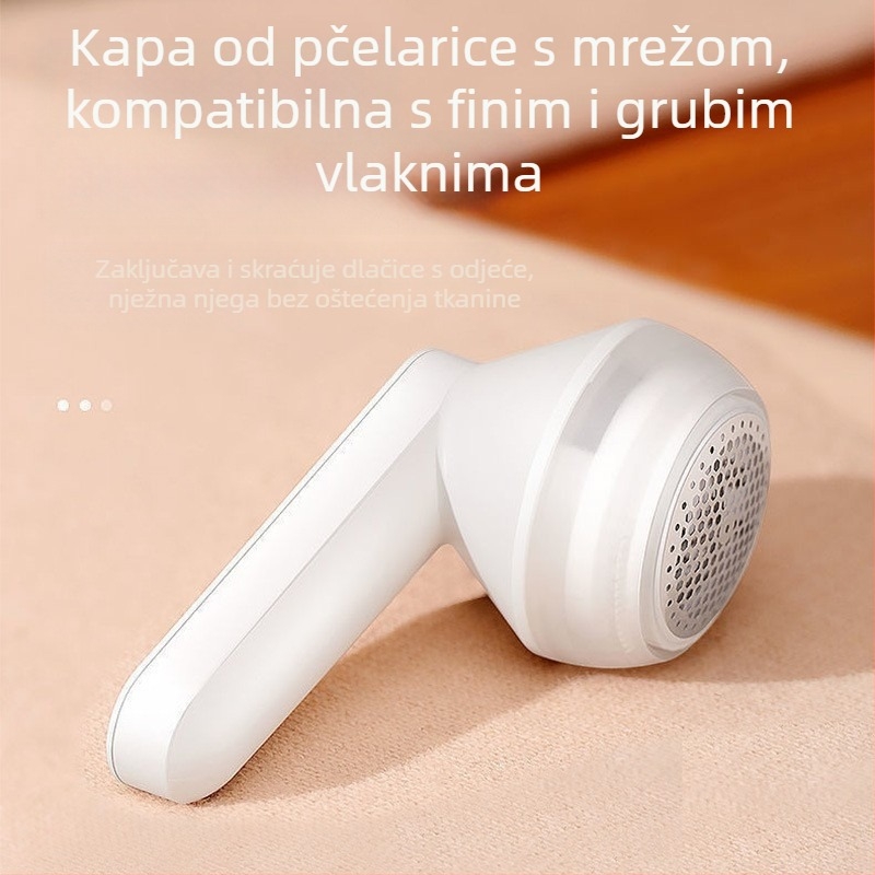 Uređaj za uklanjanje dlaka s tkanina – plastično kućište, model 719, lansiran 2024., rola za dlake i uklanjanje vlasi