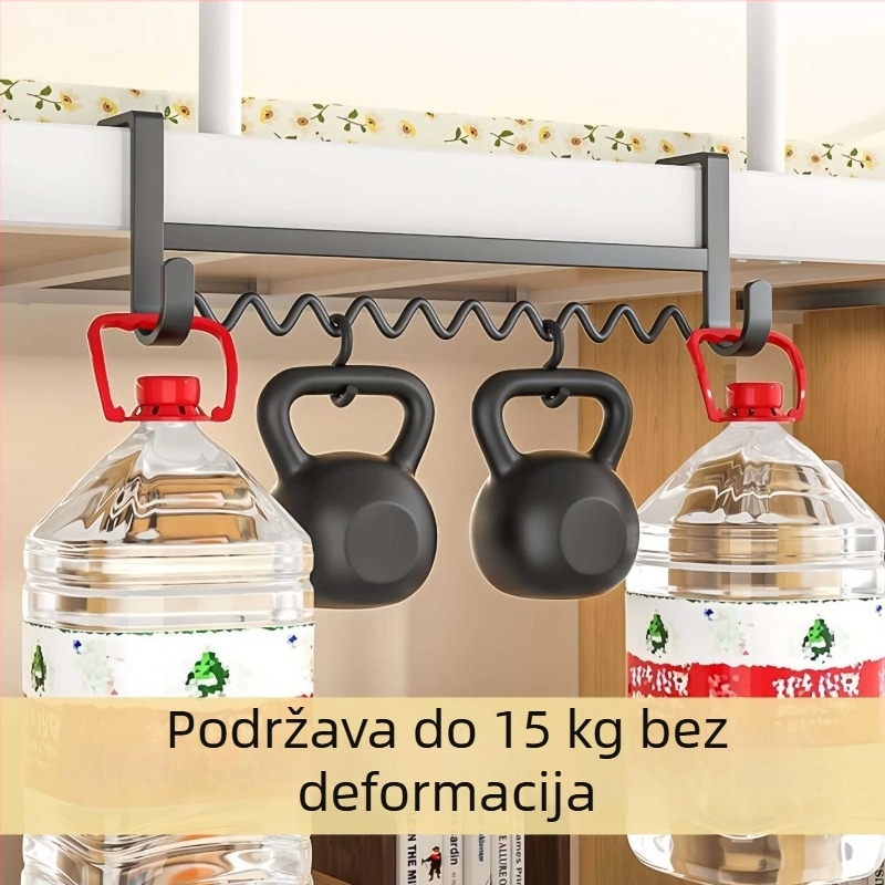 Vijugava vješalica za odjeću uz krevet u studentskoj sobi