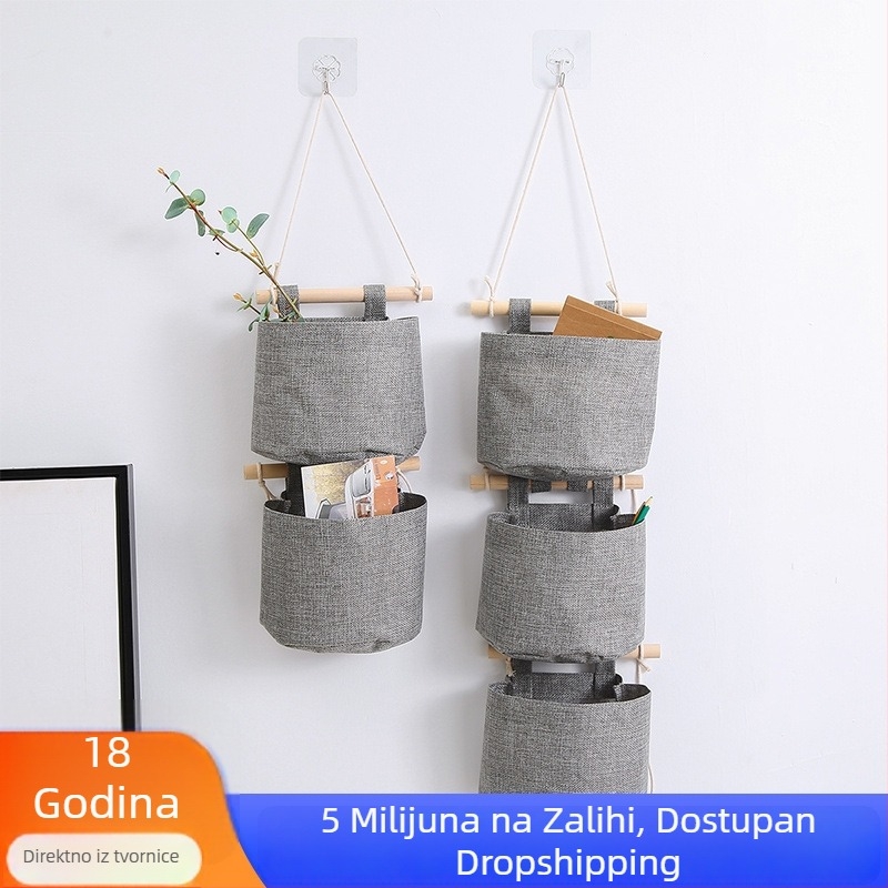 Zidna torba za odlaganje s više pretinaca, od platna.