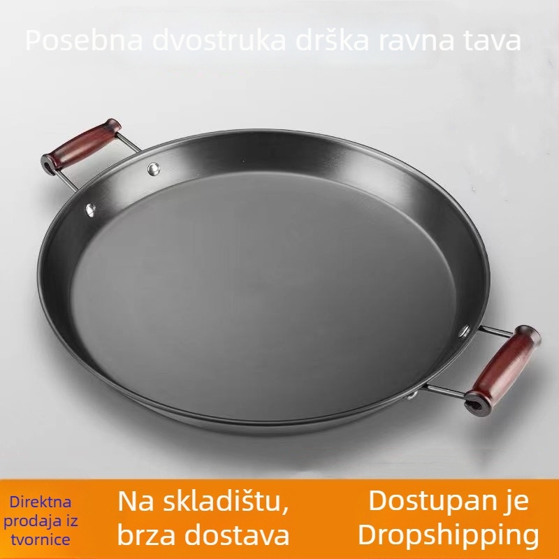Tigan od kovanog željeza bez premaza, s dvjema ručkama, ravno dno, pogodan za plinske i indukcijske štednjake.