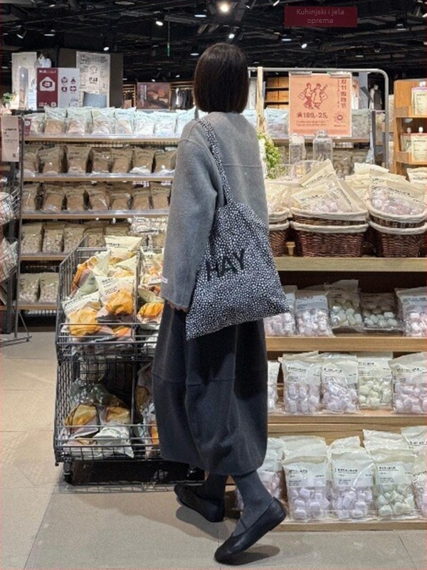 Ženska vunena suknja A-linije, kruškolikog oblika, srednje duljine, trodimenzionalni kroj, jednobojni uzorak, mikroelastičnost.