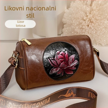 Ženska torbica preko ramena crossbody – cilindričnog oblika, PU materijal, zatvaranje na zip, unutarnji džep sa zipom