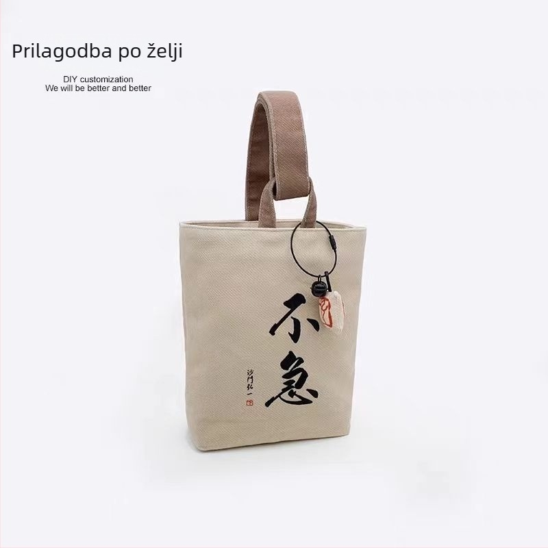 Unisex platnana bucket torba s magnetskim zatvaračem i unutarnjim džepom na zatvarač