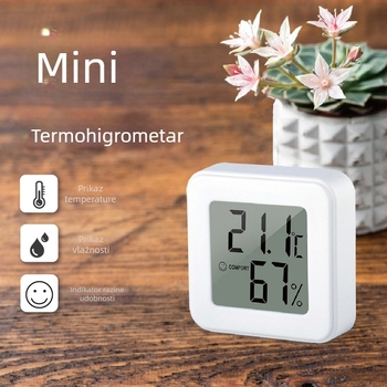 Unutarnji mjerni uređaj za temperaturu i vlagu s dizajnom osmijeha, razlučivost 0.1, pogreška mjerenja temperature ±1°C, pogreška mjerenja vlage ±5% RH, baterija LR44