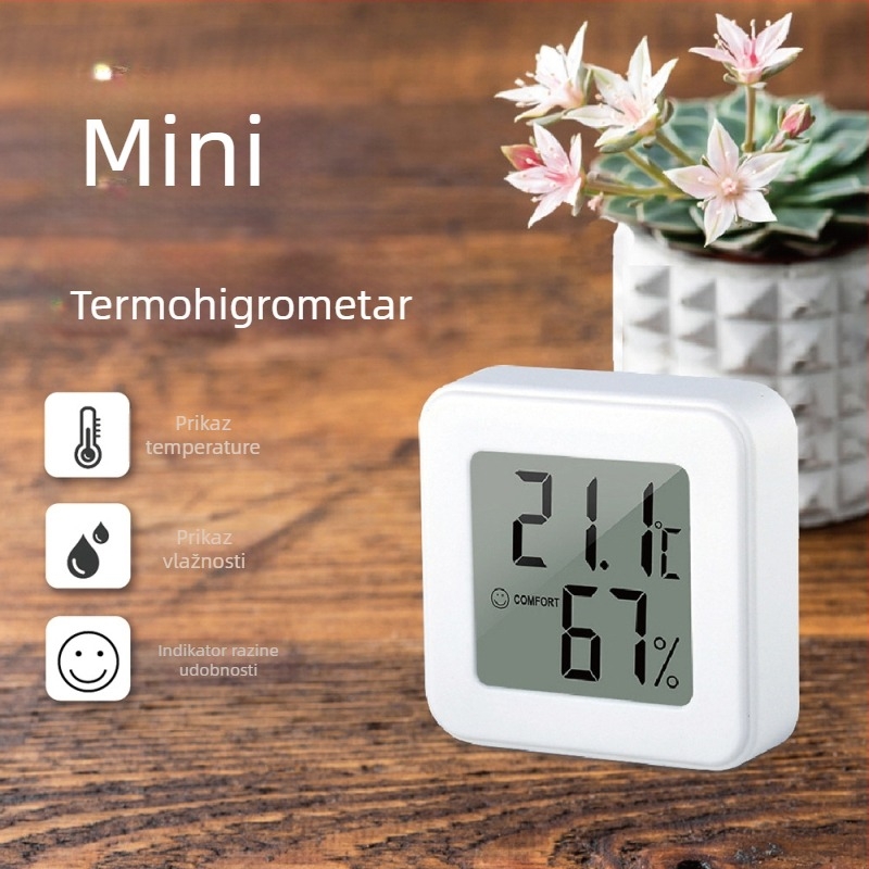 Unutarnji mjerni uređaj za temperaturu i vlagu s dizajnom osmijeha, razlučivost 0.1, pogreška mjerenja temperature ±1°C, pogreška mjerenja vlage ±5% RH, baterija LR44