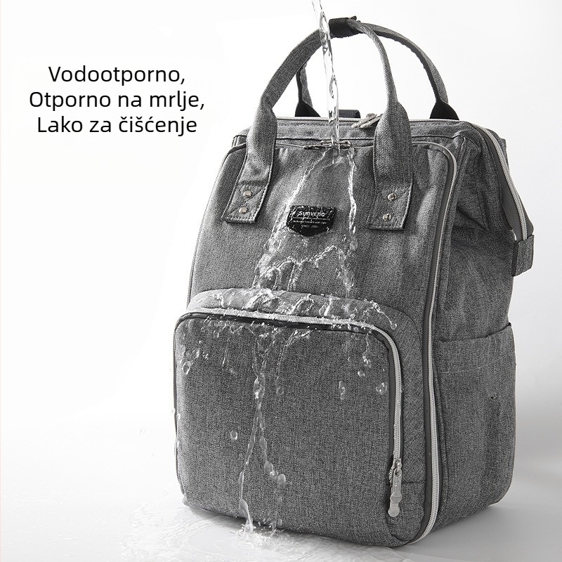 Torba za mamu – ruksak, poliester, vodootporna, razdvajanje suho/mokra, maksimalno opterećenje 15–20 kg, dimenzije 42×27×8 cm