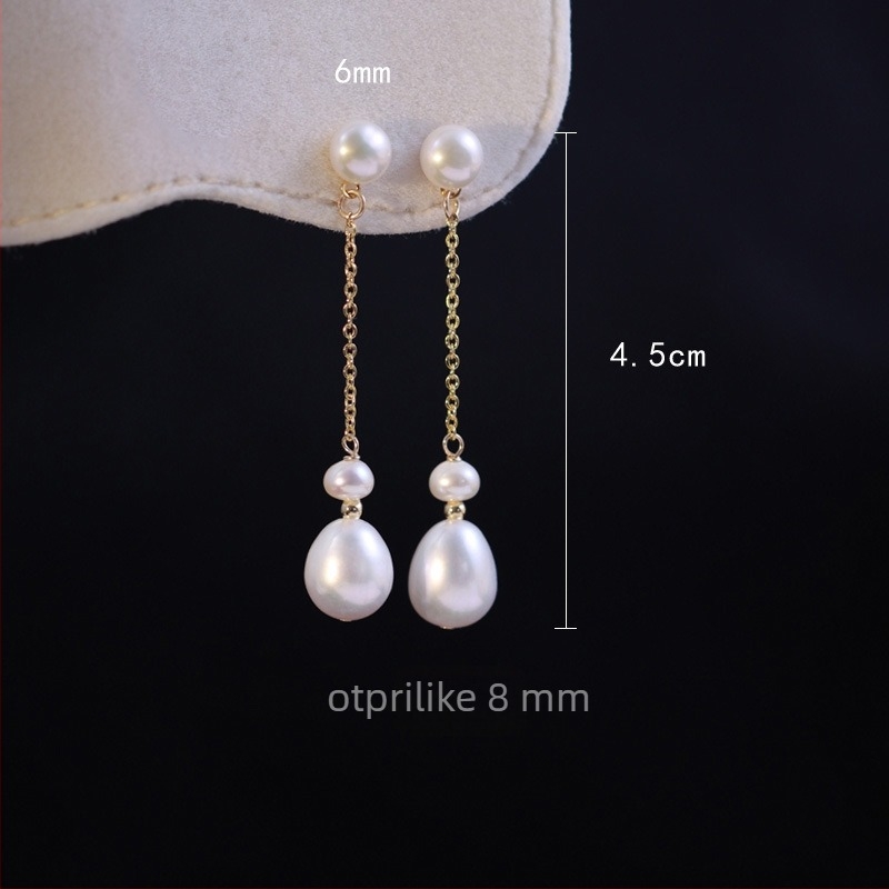 Naušnice od bisera slatkovodnog, kapljičan oblik, pozlaćene ušne žice 14K, lagani luksuz stil, jesen 2025