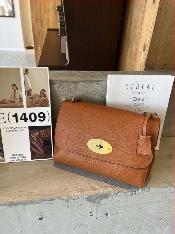 Ženska mini torbica od prave kože, horizontalni kvadratni oblik, zaključavanje, jednostavan crossbody remen, ljeto 2025