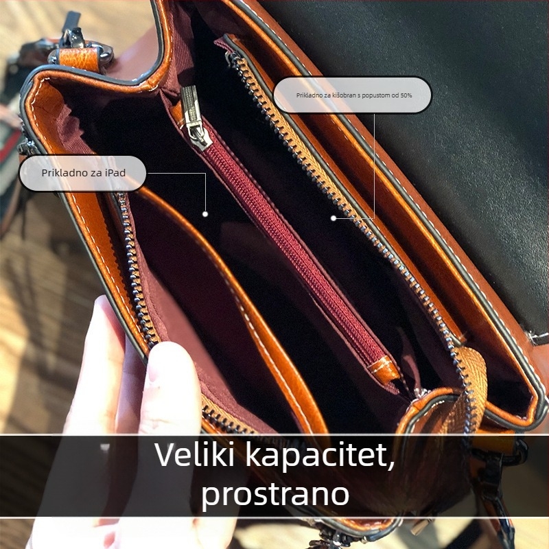 Ženska crossbody torbica od prave kože, koža s uljno-voskastim završetkom, uspravni kvadratni oblik, zatvaranje poklopac, unutarnji džepovi s patentnim zatvaračem te pretinci za mobitel i osobnu iskaznicu