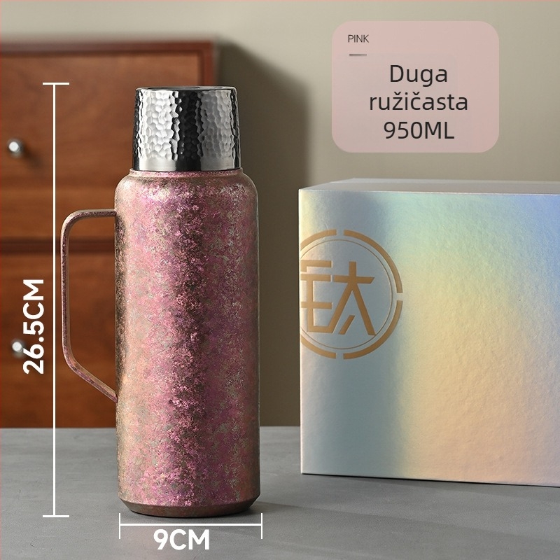 Termos od čistog titana, vakuumska izolacija, mehanički termometar, pretinac za čaj i kapak s podiznim mehanizmom.