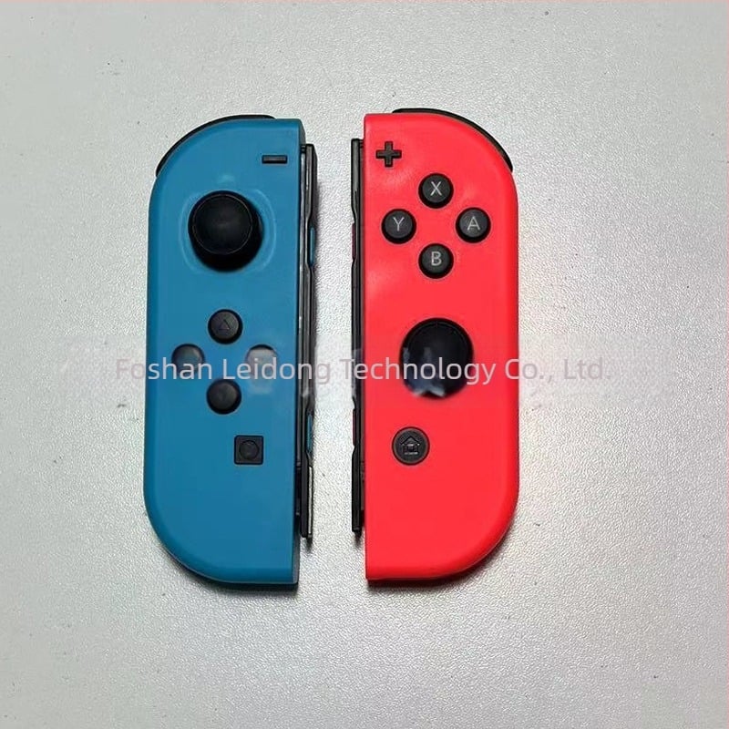 Nintendo Switch prikazni model NS s kontrolerom – rekvizit za izlog (Model:NS; Paket: domaćinska jedinica, 1 ručni kontroler, 1 par; Težina: 400 g; Verzija igre: paperback)
