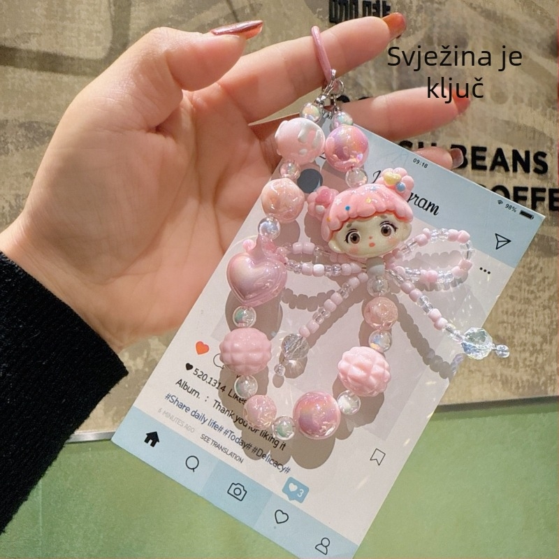 Karikatura-akrilni privjesak za telefon s kristalnom mašnicom i nizu od perlica (Brand: Hibiscus Jewelry; Materijal: Akril; Obrada: Elektropaljivanje; Vzor: Zvjezdice/Sunce i Mjesec/Nebesa; Stil: Crtani, Dodaci za telefon)