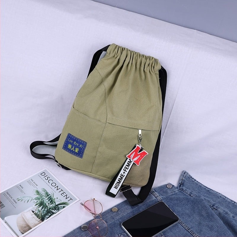 Unisex platneni ruksak sa šnuralom za sport i putovanja, kapacitet 36–55 L, proširiv, zakrivljene naramenice.
