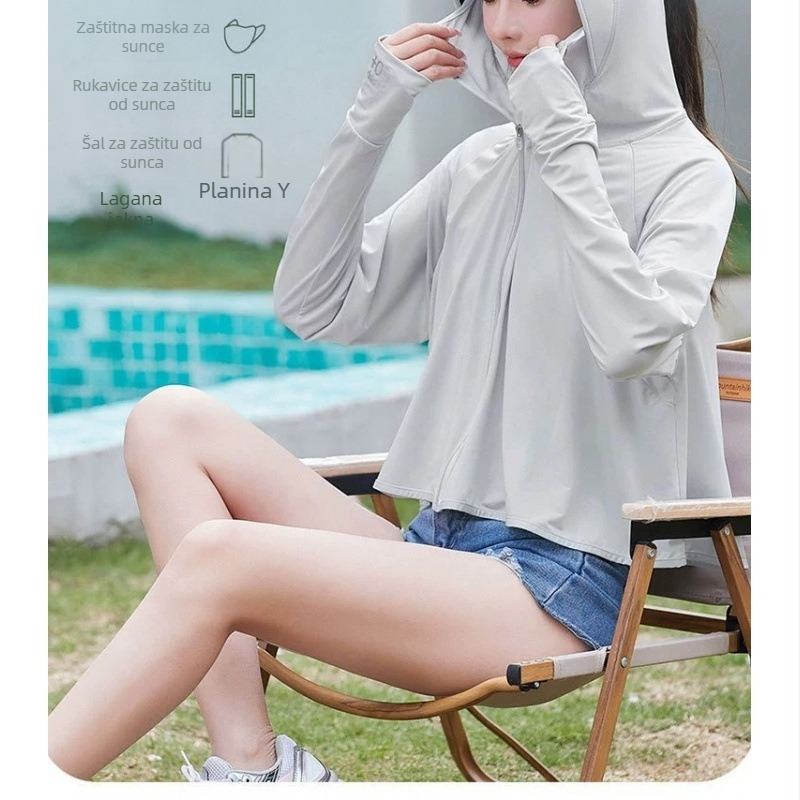 Ženska odjeća za zaštitu od sunca u stilu plašta, prozračan poliester, slobodan kroj, dugi rukavi, zatvarač, duljina 50–65 cm, sastav 90–95% poliester + 30–50% sekundarnog poliester
