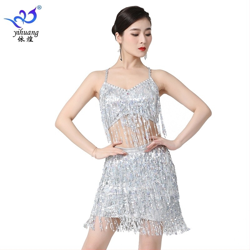 Latino plesna suknja s podijeljenim resama i štrasom – brončana tkanina, poliester/elastan, ženski model, ljeto 2025