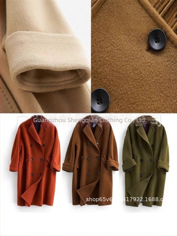 Ženski reversibilni vuneni dugi kaput, slobodan kroj, dvostruko kopčanje, lapel ovratnik, duljina 80–100 cm, 90–95% vune, spandeks i poliester
