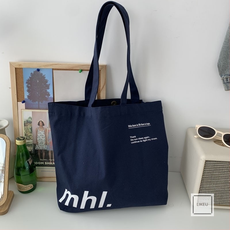 Platnena tote torba s gradski minimalističkim stilom, otvoreni gornji dio, unutarnji džepovi za telefon i ID