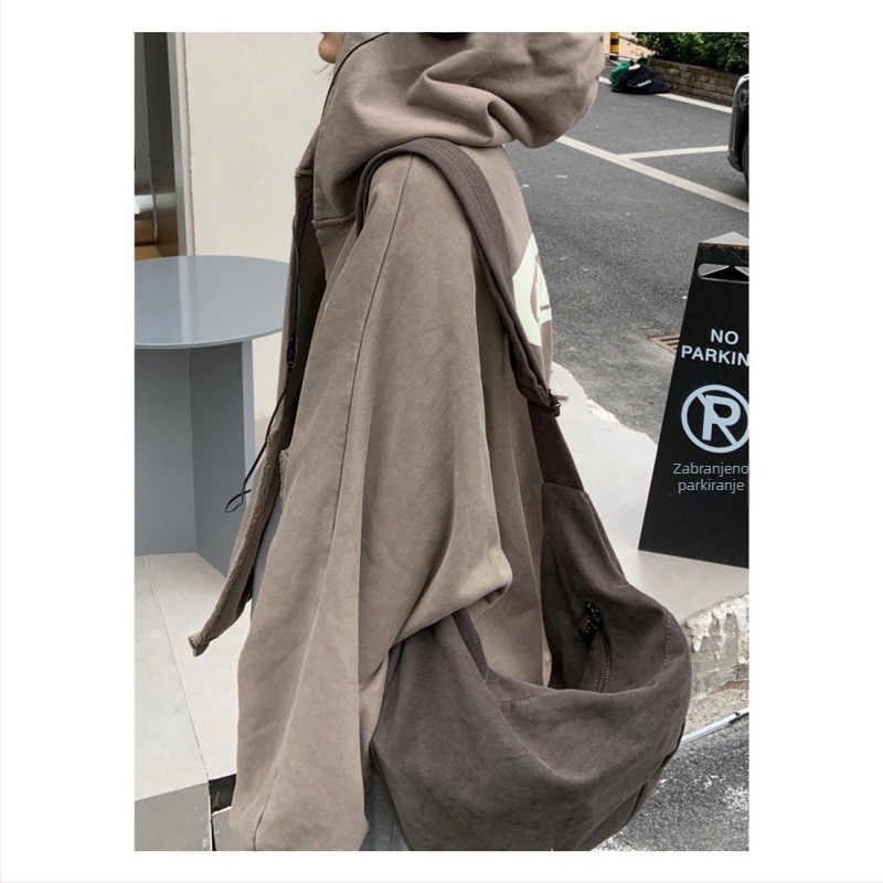 Platnena crossbody torba, unisex stil, ovalni oblik, zip zatvarač, podstava od platna, samo jedan remen