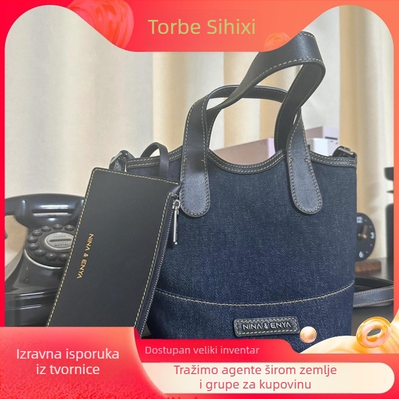 Bucket torba - urban stil jednostavnosti; Materijal: Oxford tkanina; Oblik: bucket tip; Otvaranje: magnetska kopča; Podstava: platno