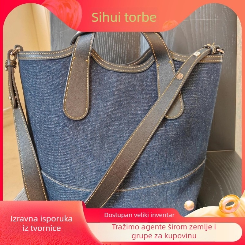 Bucket torba - urban stil jednostavnosti; Materijal: Oxford tkanina; Oblik: bucket tip; Otvaranje: magnetska kopča; Podstava: platno
